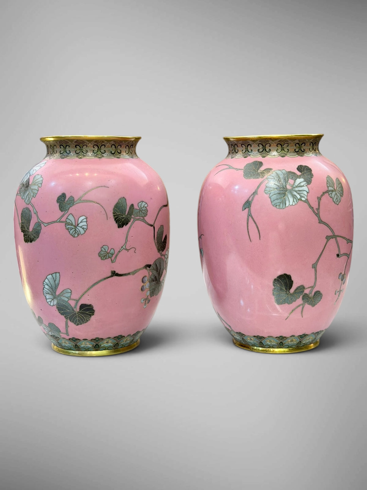 A FINE PAIR OF JAPANESE CLOISONNÉ ENAMEL VASES WITH BIRDS AND GRAPEVINE, IN THE MANNER OF NAMIKAWA SŌSUKE-Meiji period