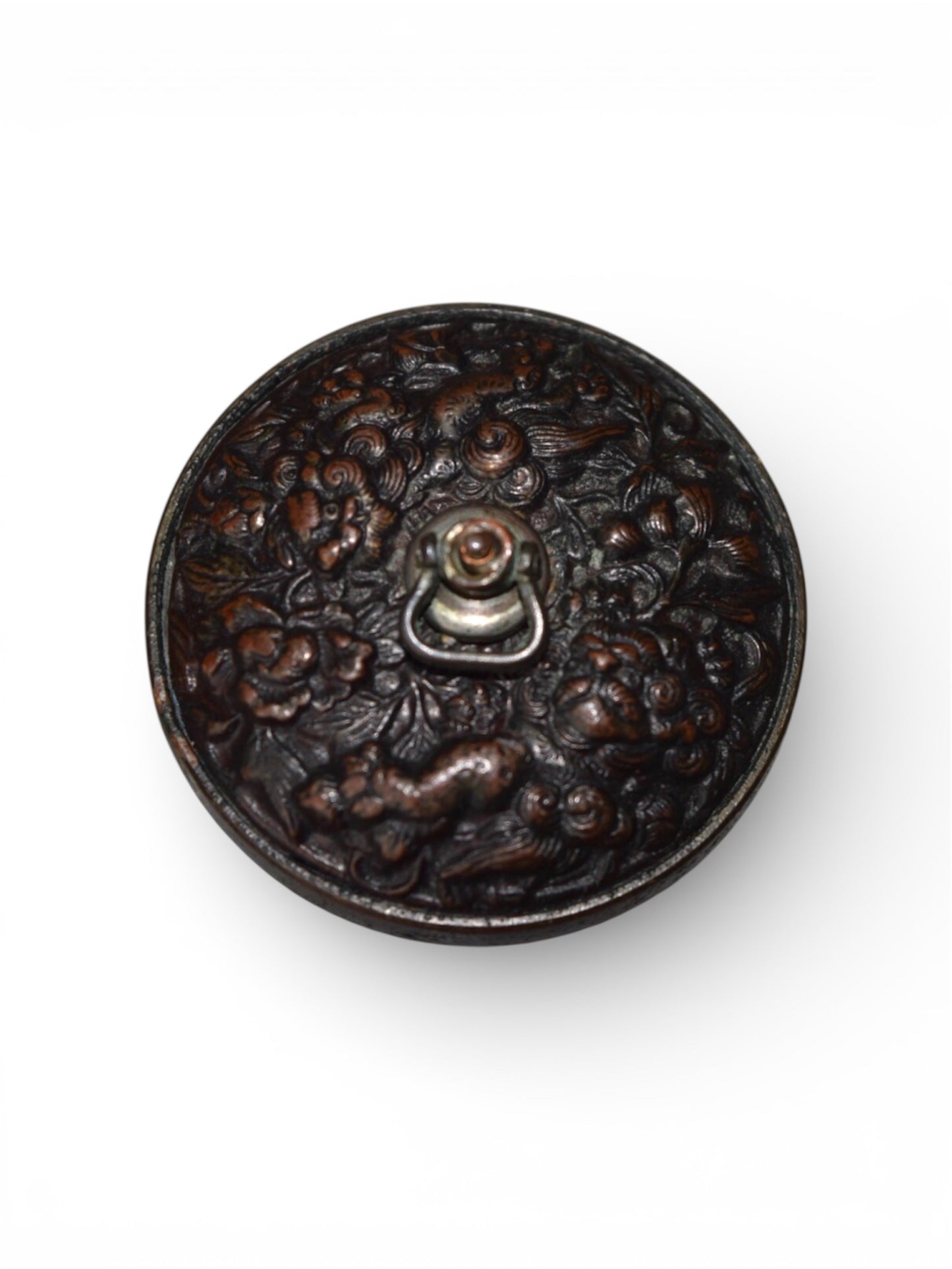A Fine Japanese Bronze Manju Netsuke with Shishi and Peony, Meiji period