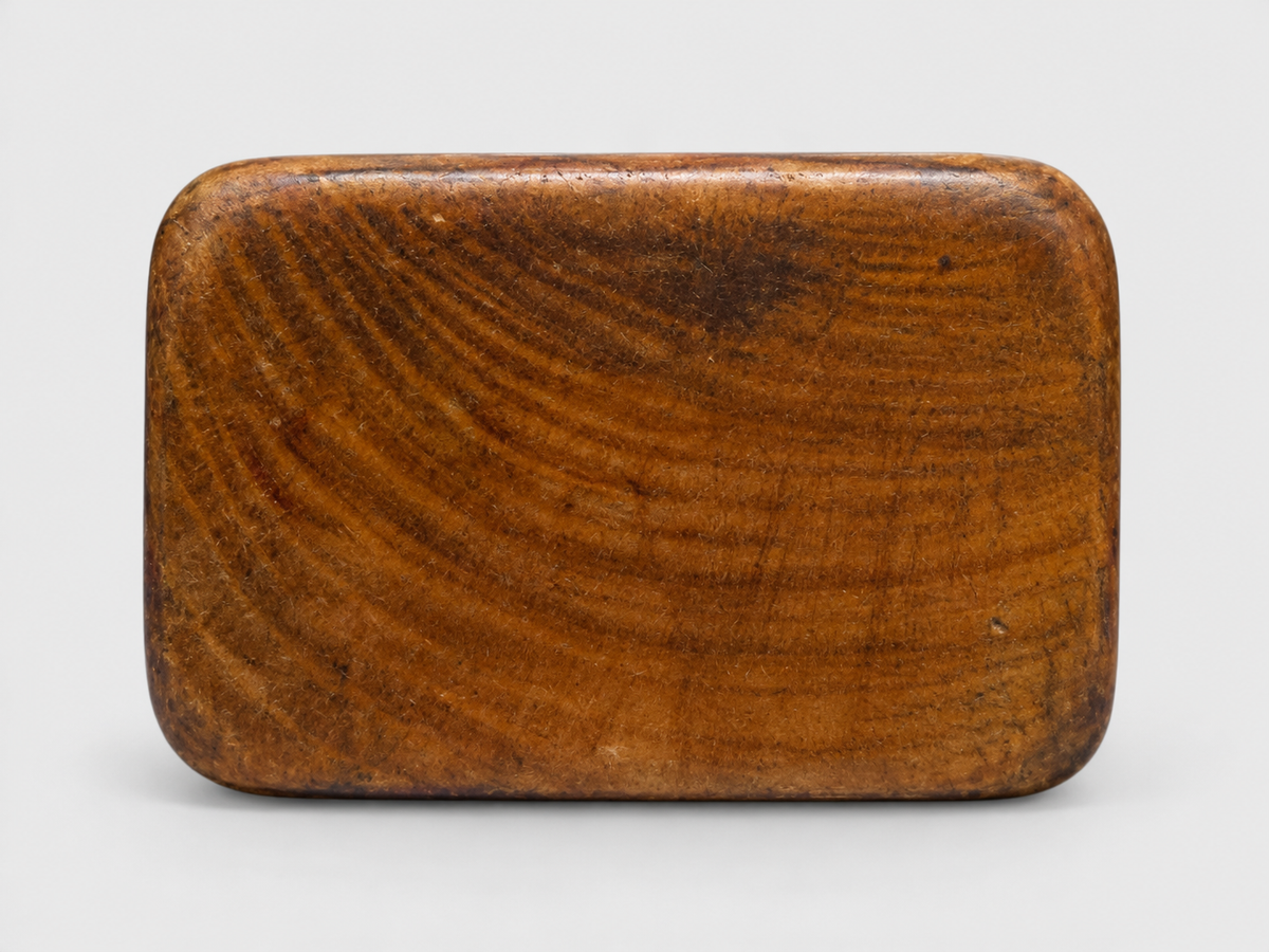 A Superb Wood Seal-Type (Ingyō) Netsuke of a Shishi and Cub

Japan, Meiji period (1868–1912)