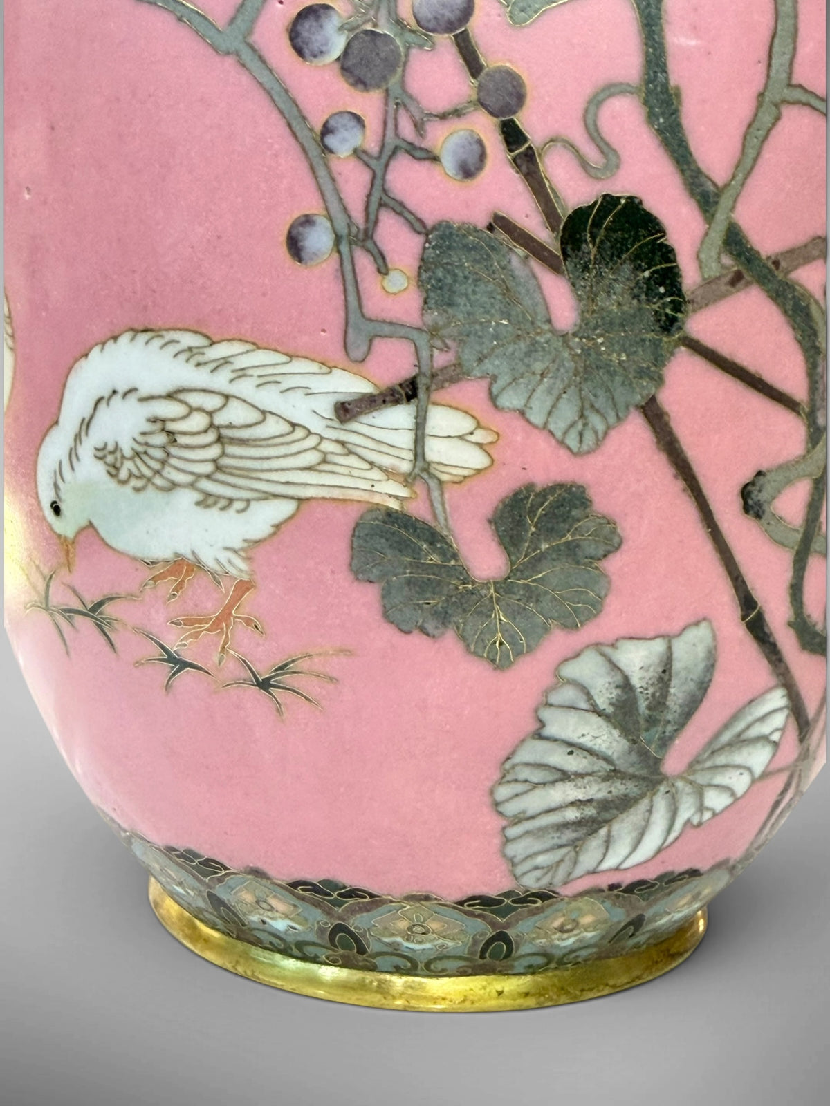 A FINE PAIR OF JAPANESE CLOISONNÉ ENAMEL VASES WITH BIRDS AND GRAPEVINE, IN THE MANNER OF NAMIKAWA SŌSUKE-Meiji period