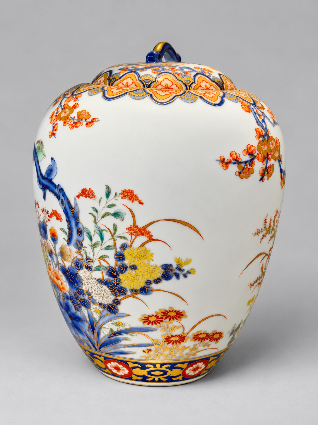 A Fine Fukagawa Porcelain Covered Jar with Prunus, Chrysanthemums and Birds.     Meiji period