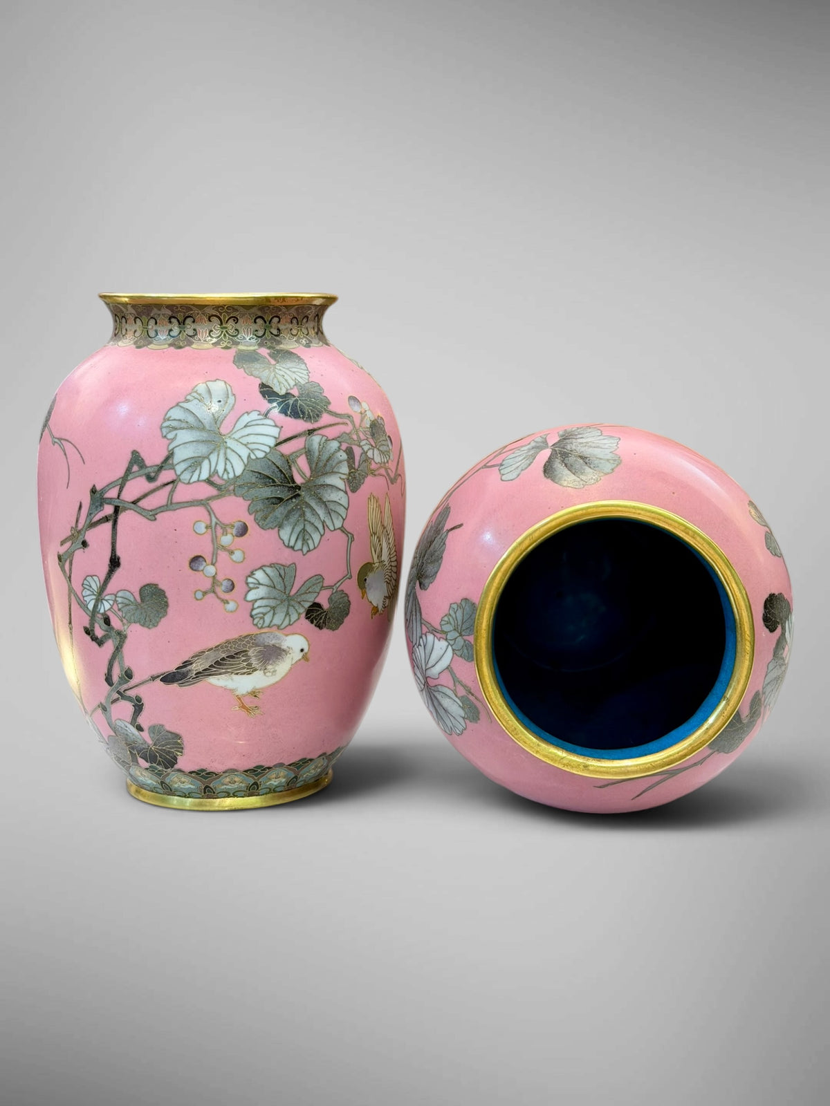 A FINE PAIR OF JAPANESE CLOISONNÉ ENAMEL VASES WITH BIRDS AND GRAPEVINE, IN THE MANNER OF NAMIKAWA SŌSUKE-Meiji period