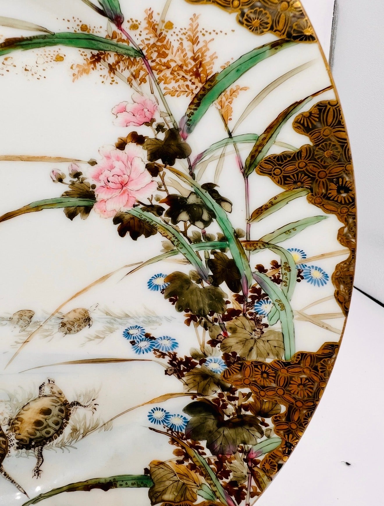 A Fine Japanese Kutani Porcelain Plate Decorated with Turtles Amongst Foliage Meiji period