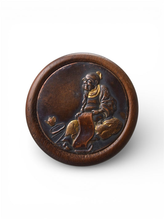 A Fine Japanese Mixed-Metal Kagamibuta Netsuke, Meiji period