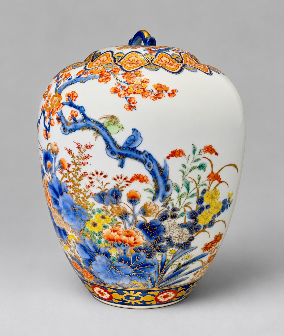 A Fine Fukagawa Porcelain Covered Jar with Prunus, Chrysanthemums and Birds.     Meiji period