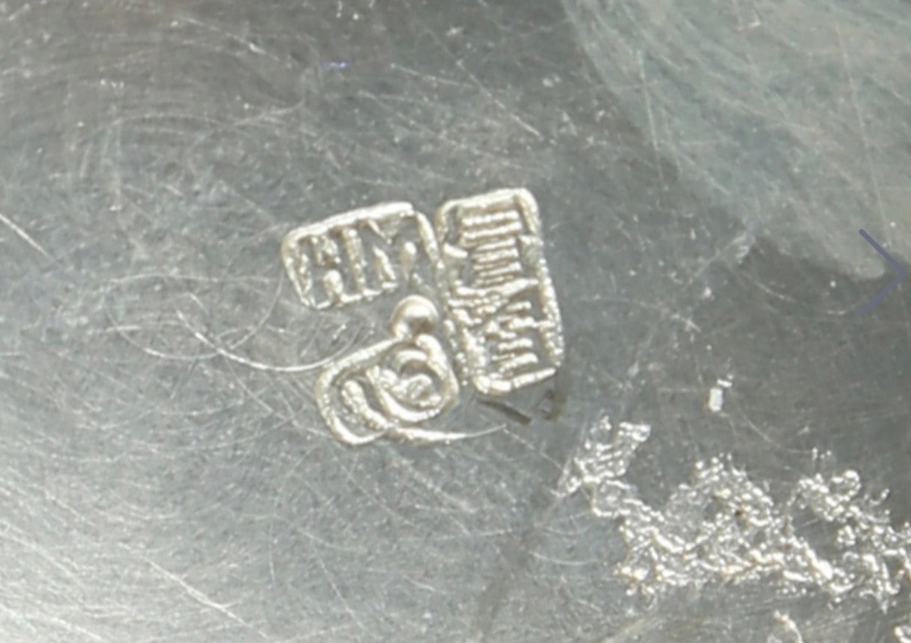 A Japanese silver lobed bowl on foot, Meiji period (1868–1912), signed Jungin and with workshop mark