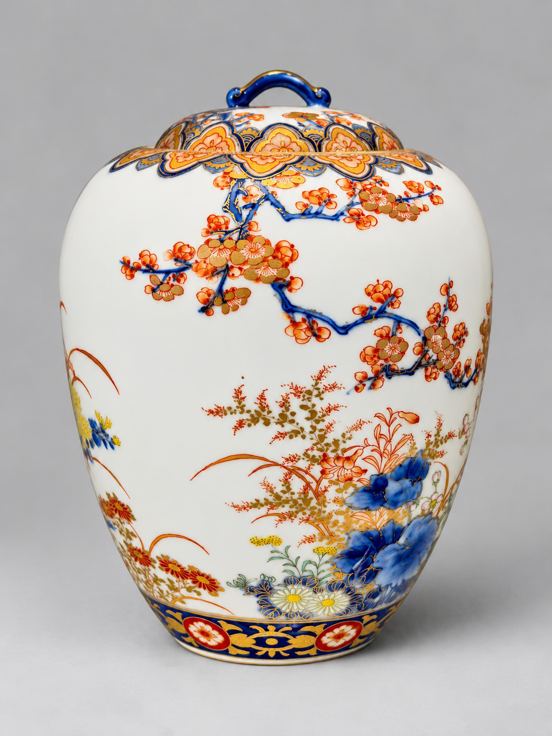 A Fine Fukagawa Porcelain Covered Jar with Prunus, Chrysanthemums and Birds.     Meiji period