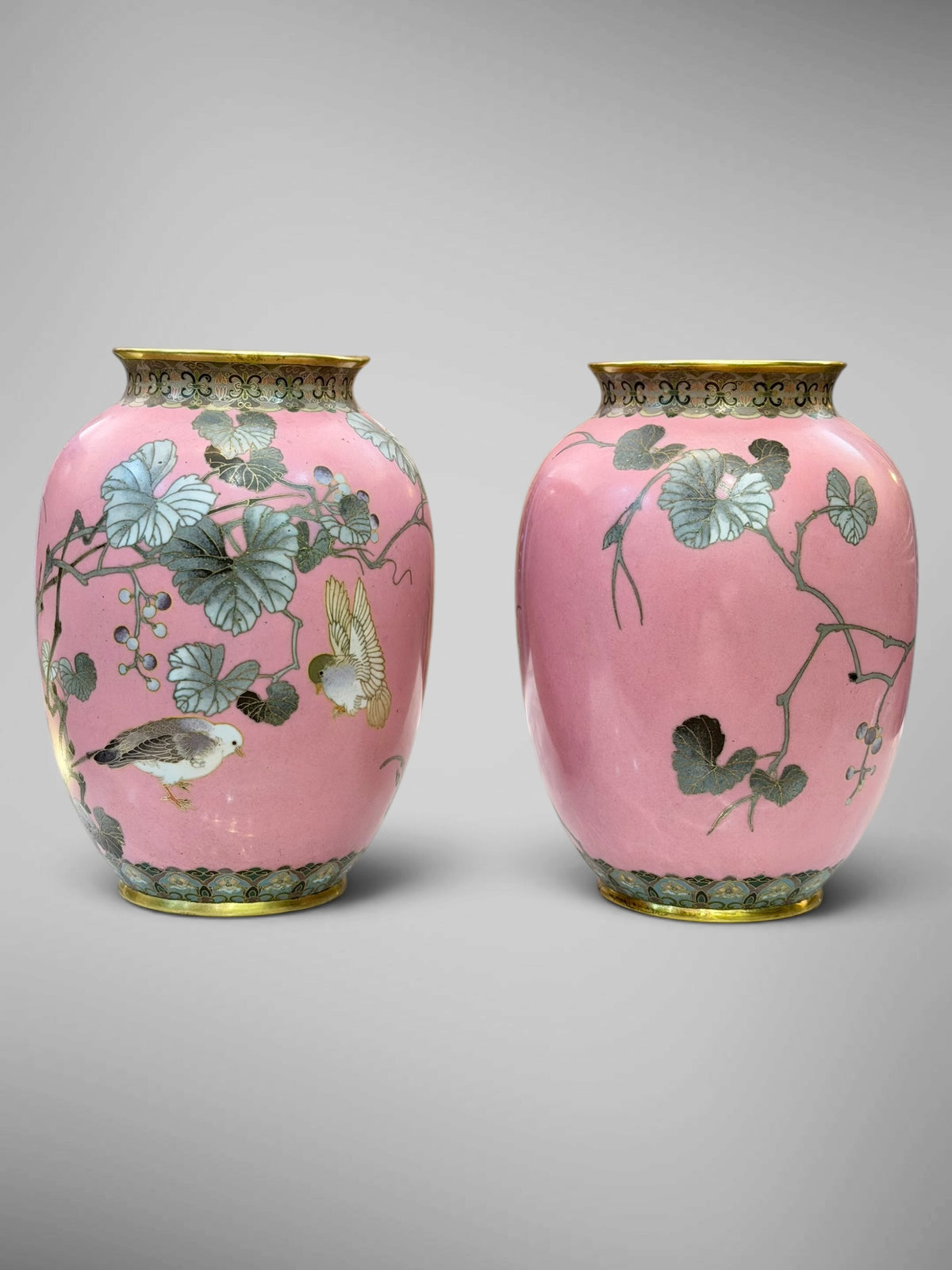 A FINE PAIR OF JAPANESE CLOISONNÉ ENAMEL VASES WITH BIRDS AND GRAPEVINE, IN THE MANNER OF NAMIKAWA SŌSUKE-Meiji period