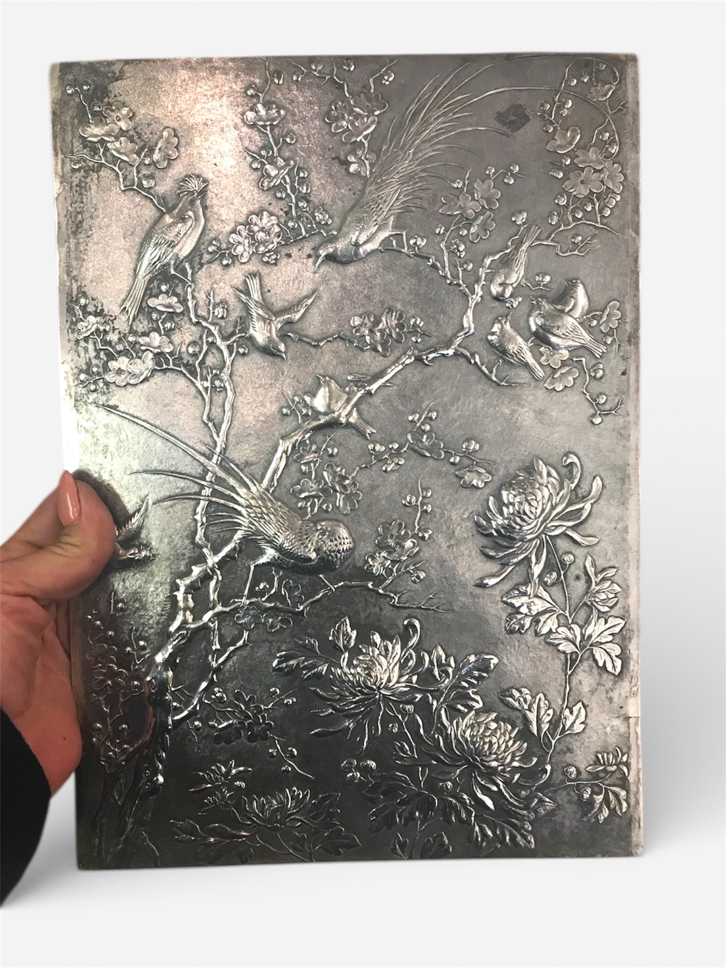 An Important Japanese Silver Repoussé Presentation Album Cover, Tokyo, Meiji period