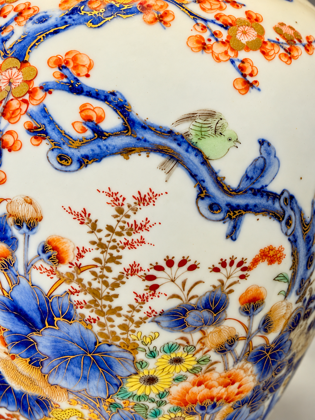 A Fine Fukagawa Porcelain Covered Jar with Prunus, Chrysanthemums and Birds.     Meiji period