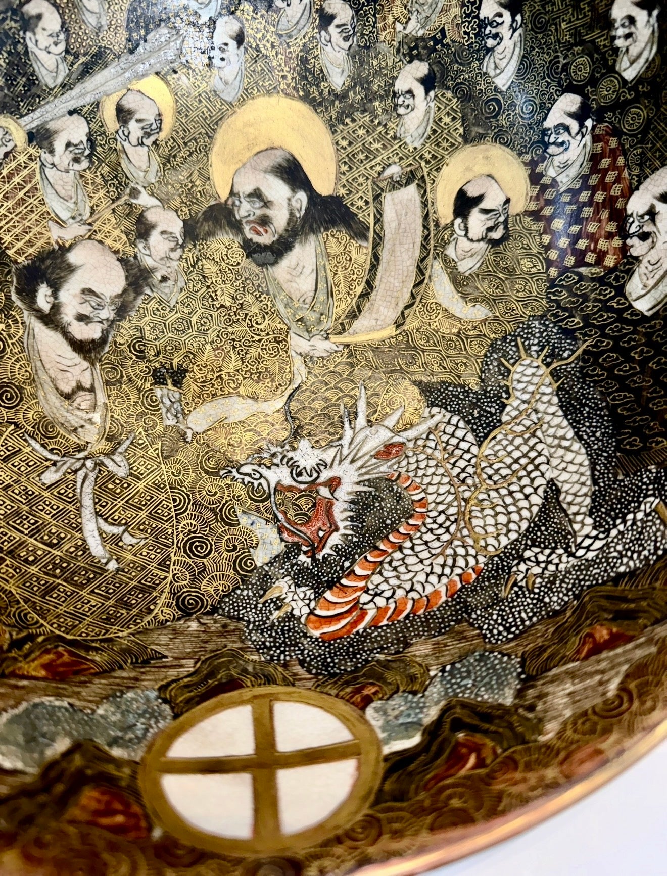A Large Japanese Satsuma Bowl -Dragon and 100 Rakan. Signed .Meiji Era