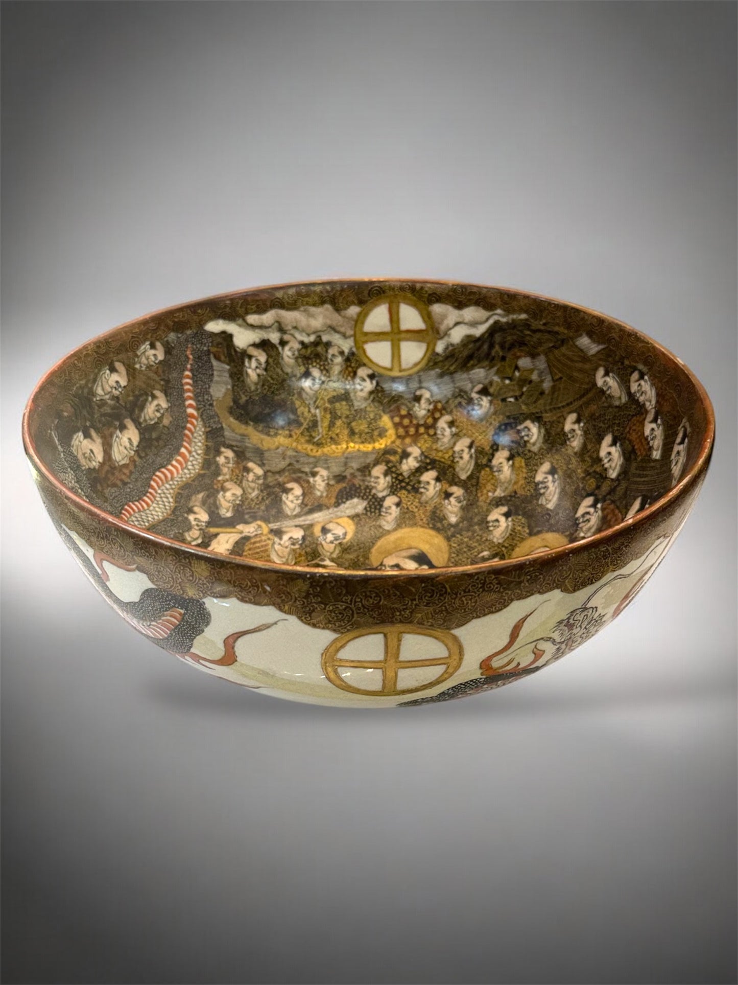 A Large Japanese Satsuma Bowl -Dragon and 100 Rakan. Signed .Meiji Era