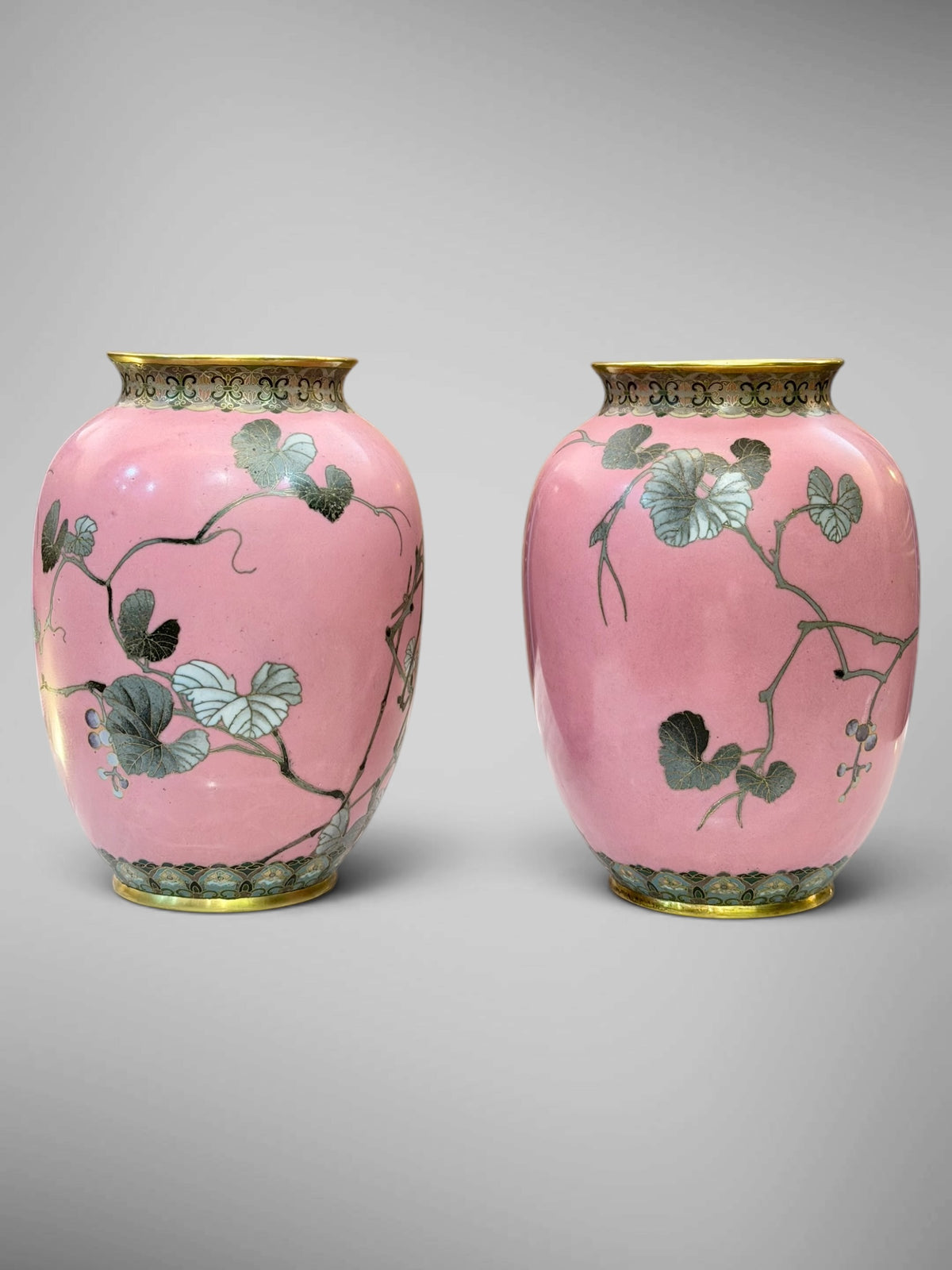 A FINE PAIR OF JAPANESE CLOISONNÉ ENAMEL VASES WITH BIRDS AND GRAPEVINE, IN THE MANNER OF NAMIKAWA SŌSUKE-Meiji period