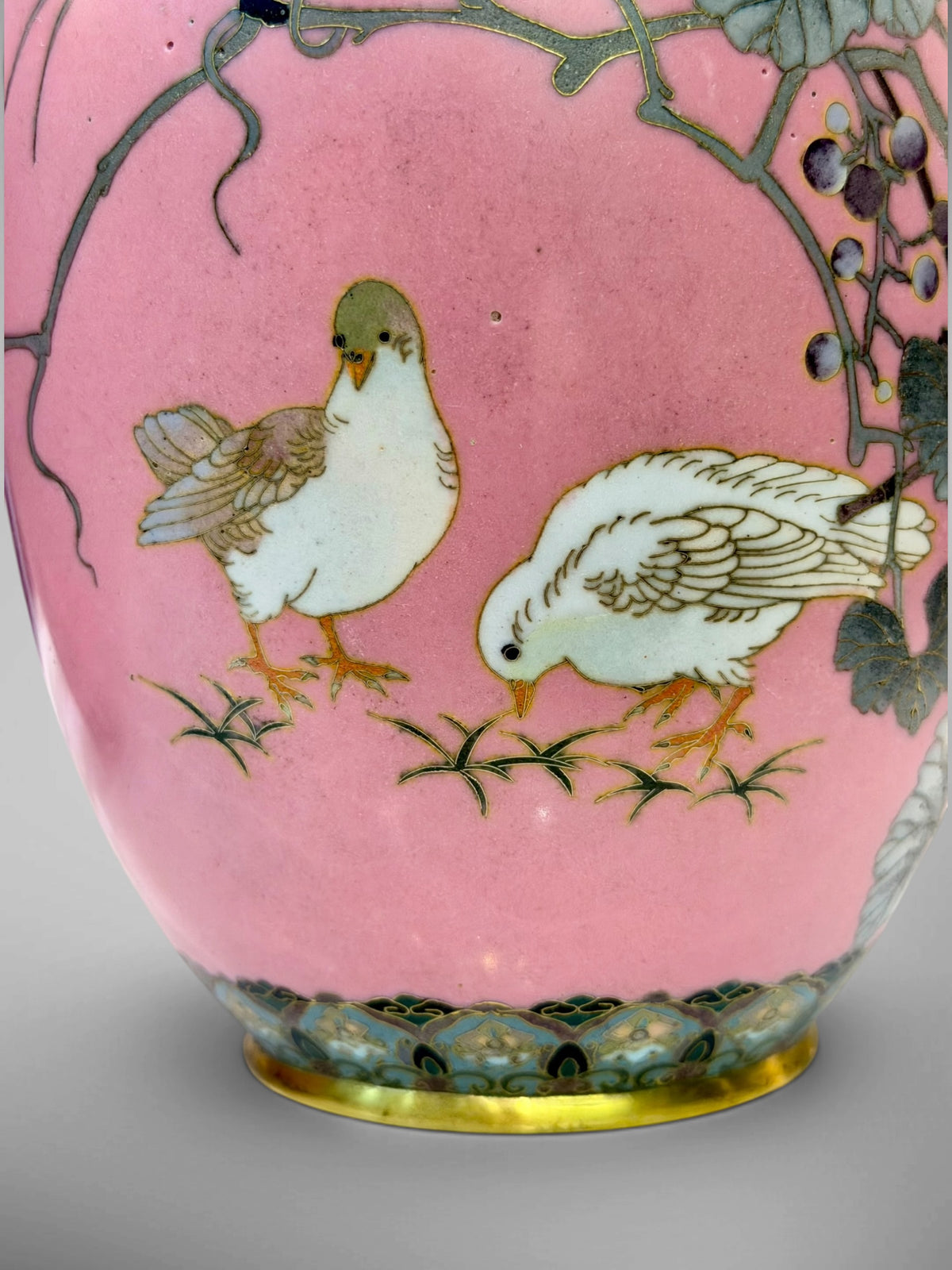A FINE PAIR OF JAPANESE CLOISONNÉ ENAMEL VASES WITH BIRDS AND GRAPEVINE, IN THE MANNER OF NAMIKAWA SŌSUKE-Meiji period
