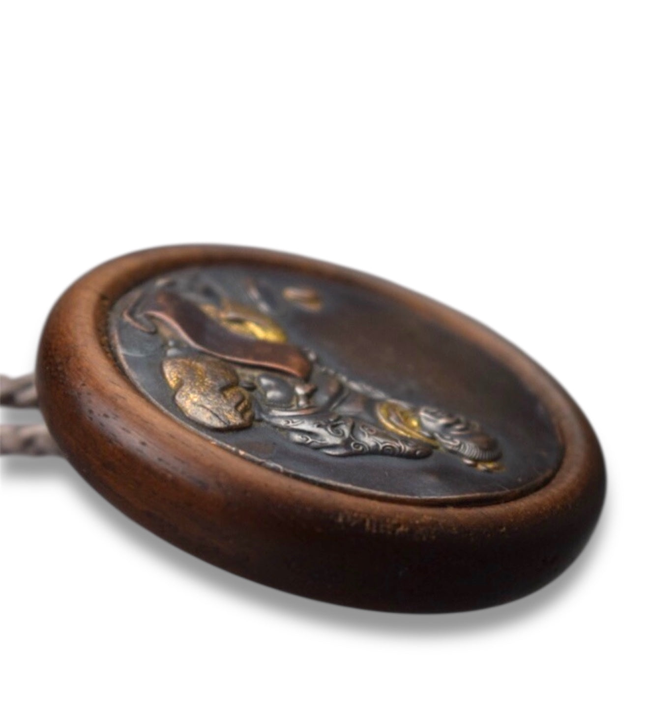 A Fine Japanese Mixed-Metal Kagamibuta Netsuke, Meiji period