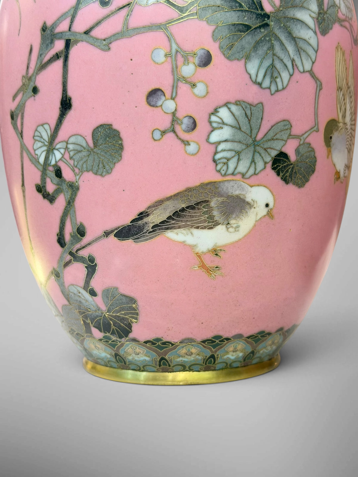A FINE PAIR OF JAPANESE CLOISONNÉ ENAMEL VASES WITH BIRDS AND GRAPEVINE, IN THE MANNER OF NAMIKAWA SŌSUKE-Meiji period