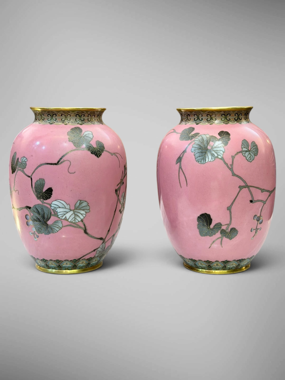 A FINE PAIR OF JAPANESE CLOISONNÉ ENAMEL VASES WITH BIRDS AND GRAPEVINE, IN THE MANNER OF NAMIKAWA SŌSUKE-Meiji period
