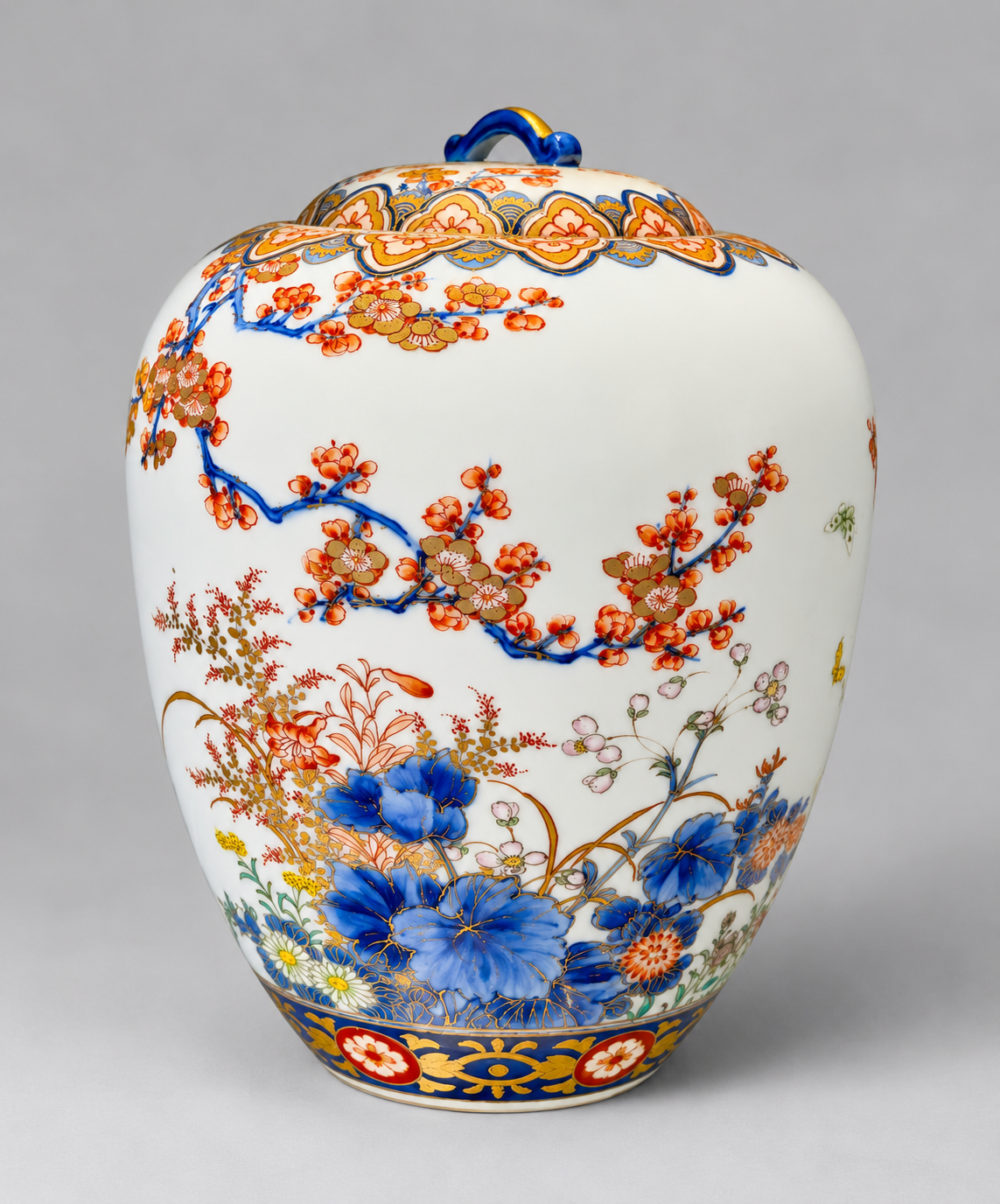 A Fine Fukagawa Porcelain Covered Jar with Prunus, Chrysanthemums and Birds.     Meiji period