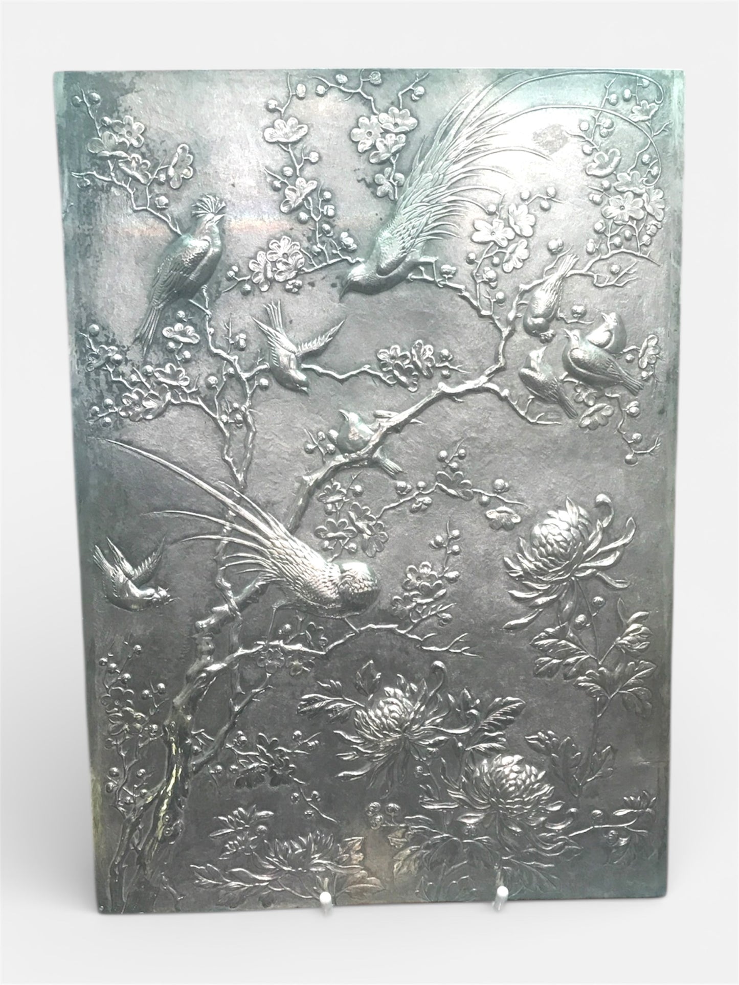 An Important Japanese Silver Repoussé Presentation Album Cover, Tokyo, Meiji period