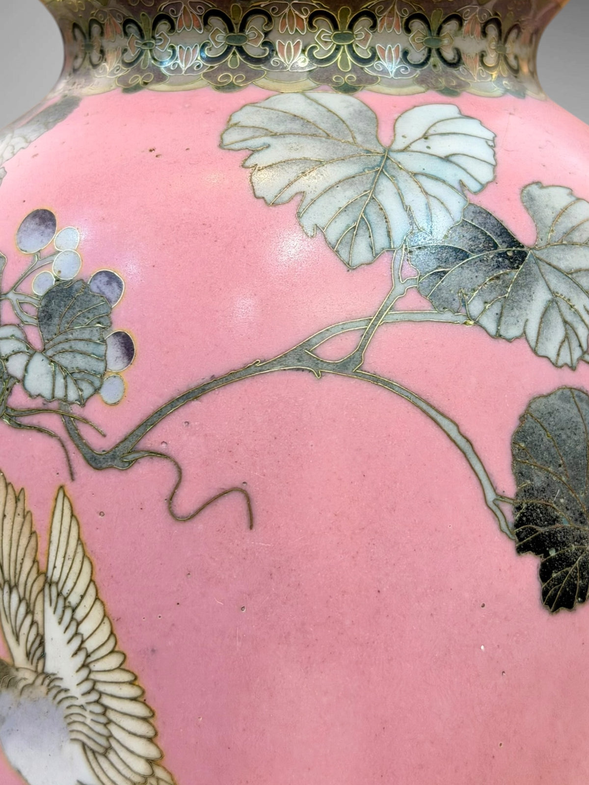 A FINE PAIR OF JAPANESE CLOISONNÉ ENAMEL VASES WITH BIRDS AND GRAPEVINE, IN THE MANNER OF NAMIKAWA SŌSUKE-Meiji period