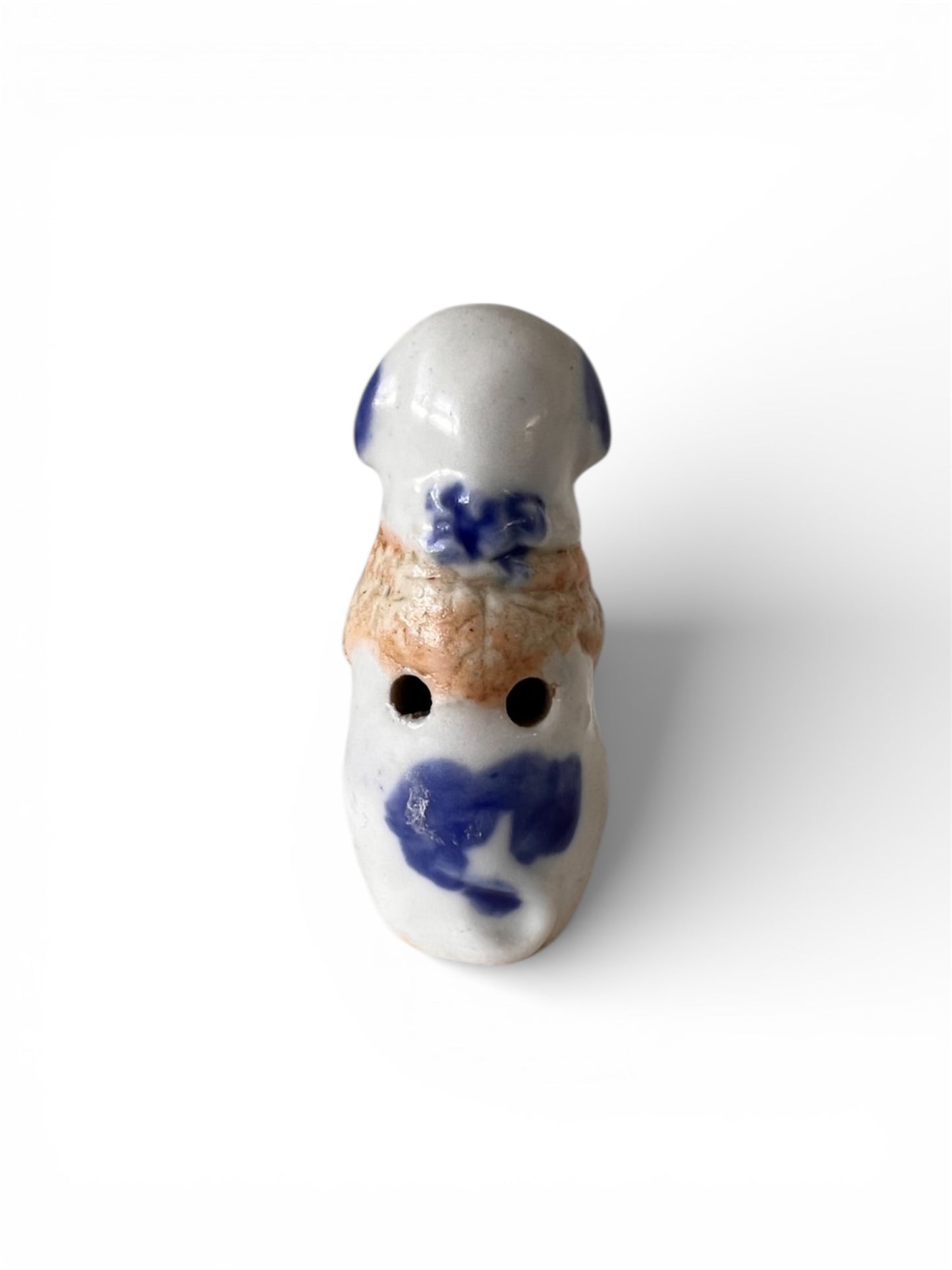 A Rare Japanese Hirado Porcelain Netsuke of a Whistle in the Form of a Dog, Meiji Period