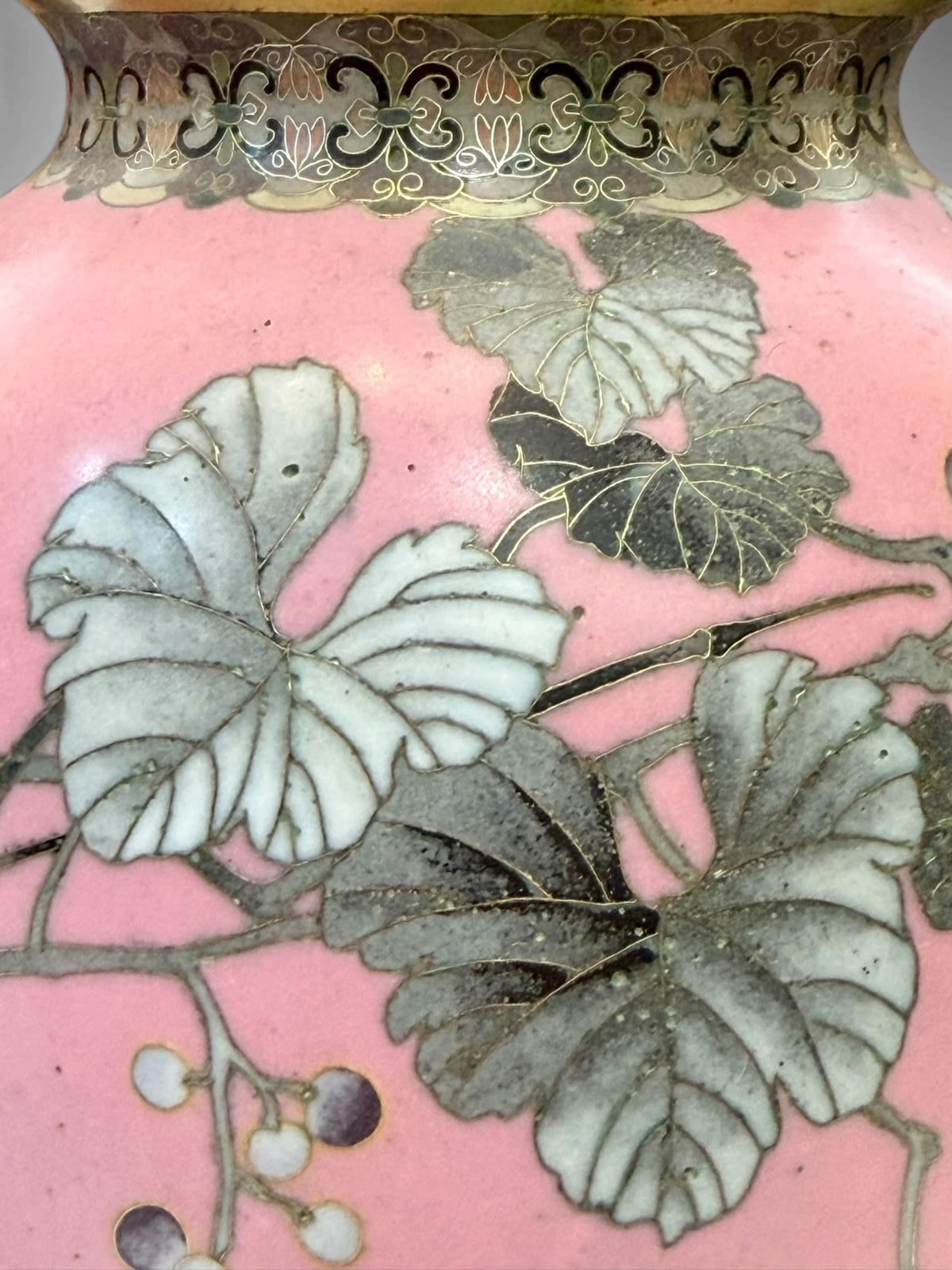 A FINE PAIR OF JAPANESE CLOISONNÉ ENAMEL VASES WITH BIRDS AND GRAPEVINE, IN THE MANNER OF NAMIKAWA SŌSUKE-Meiji period