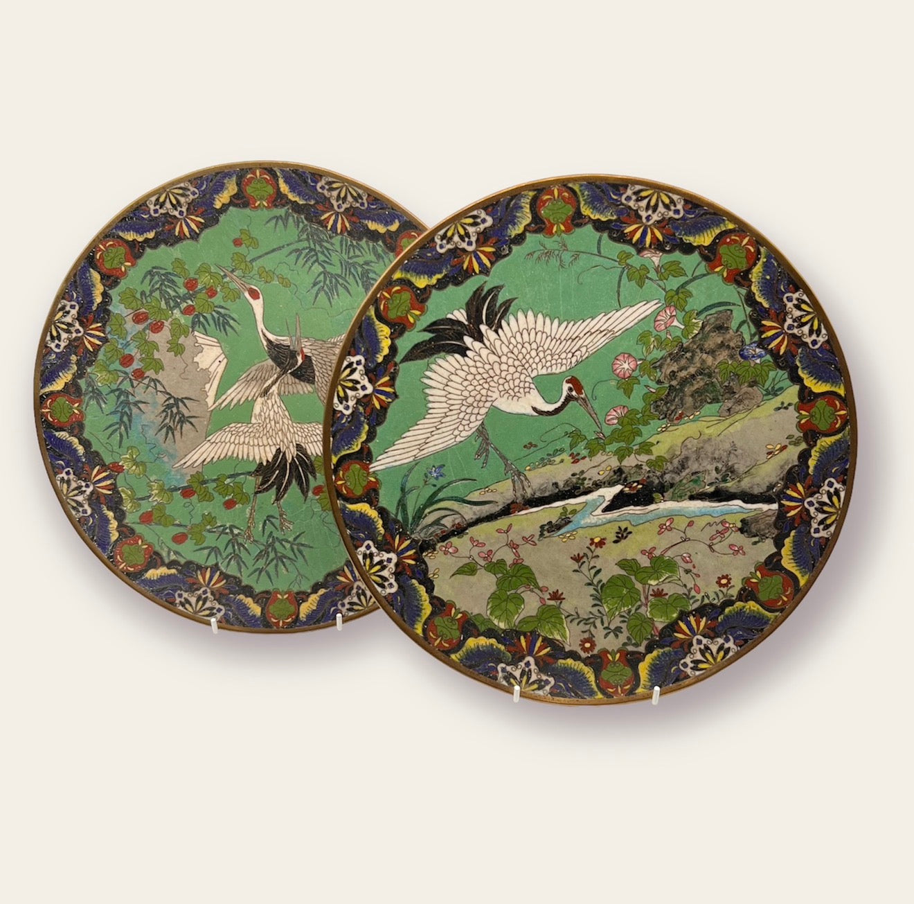 A Rare Pair of Japanese Cloisonné Chargers with White Cranes Meiji Period, Late 19th Century