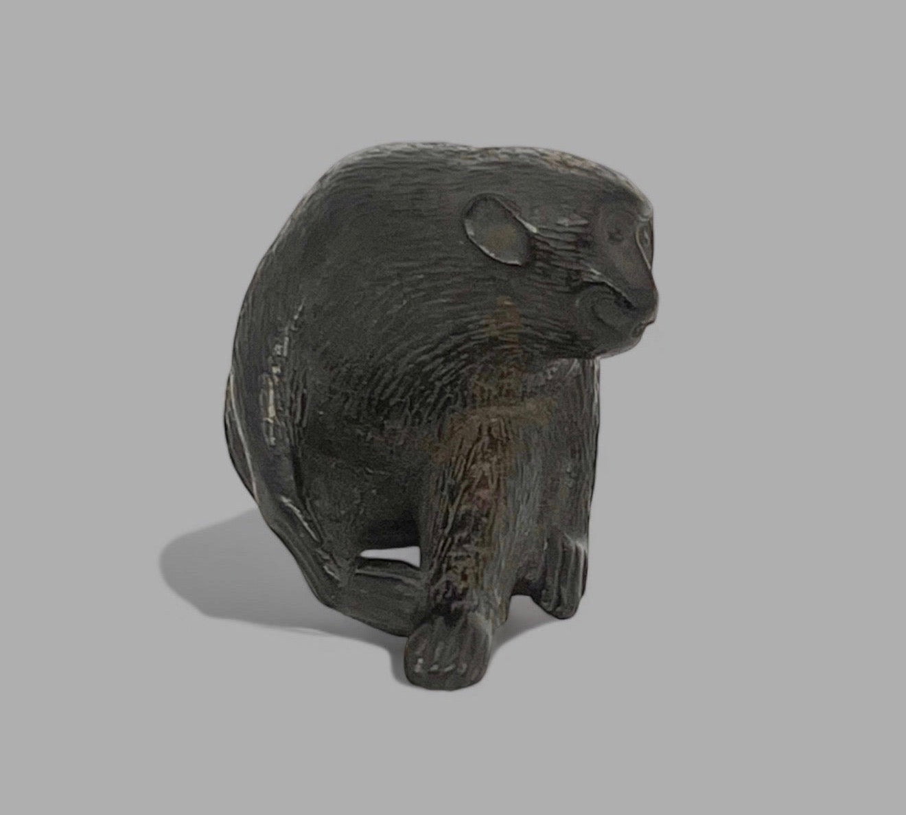 A Fine Japanese wooden netsuke of a monkey.Edo period