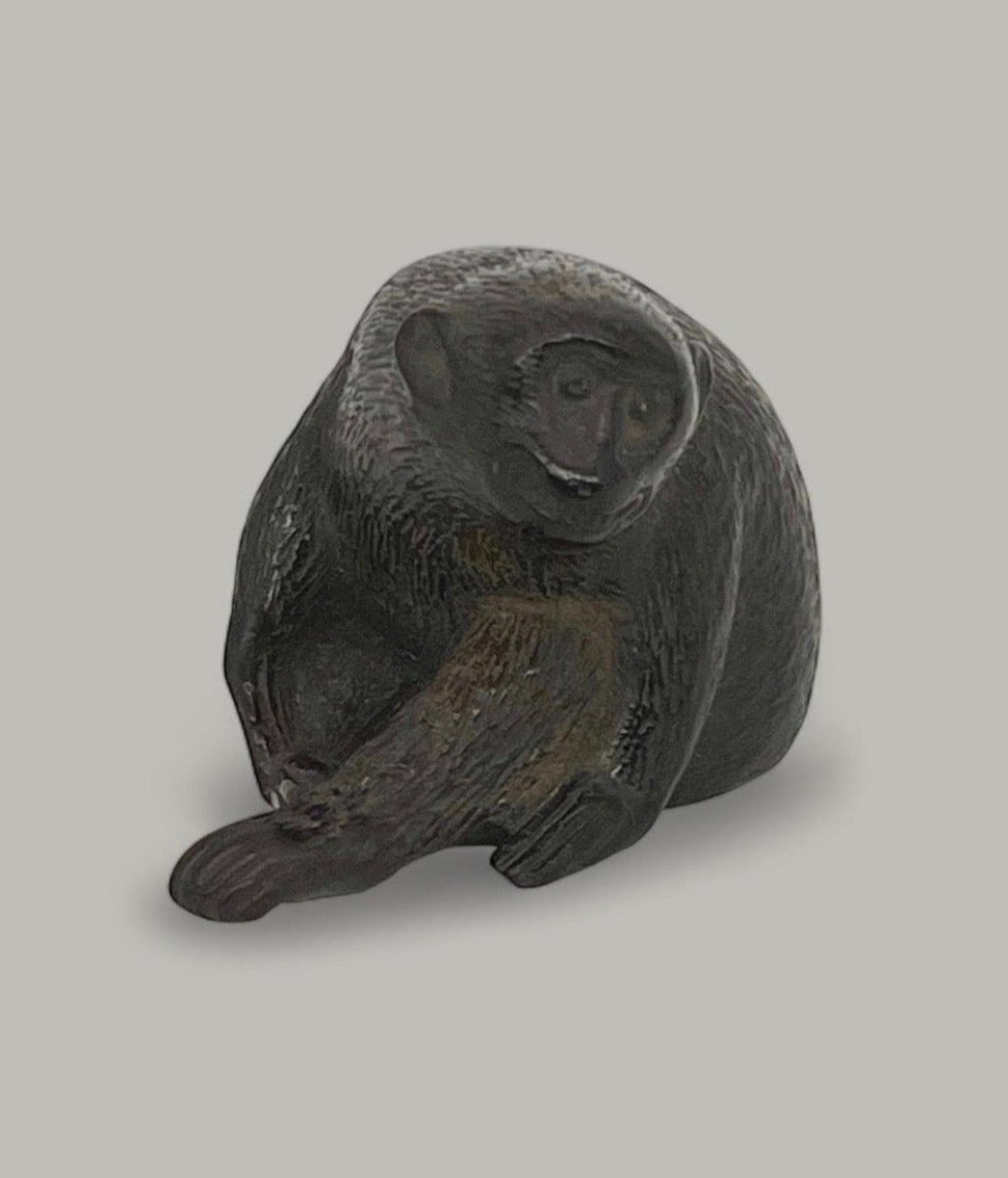 A Fine Japanese wooden netsuke of a monkey.Edo period
