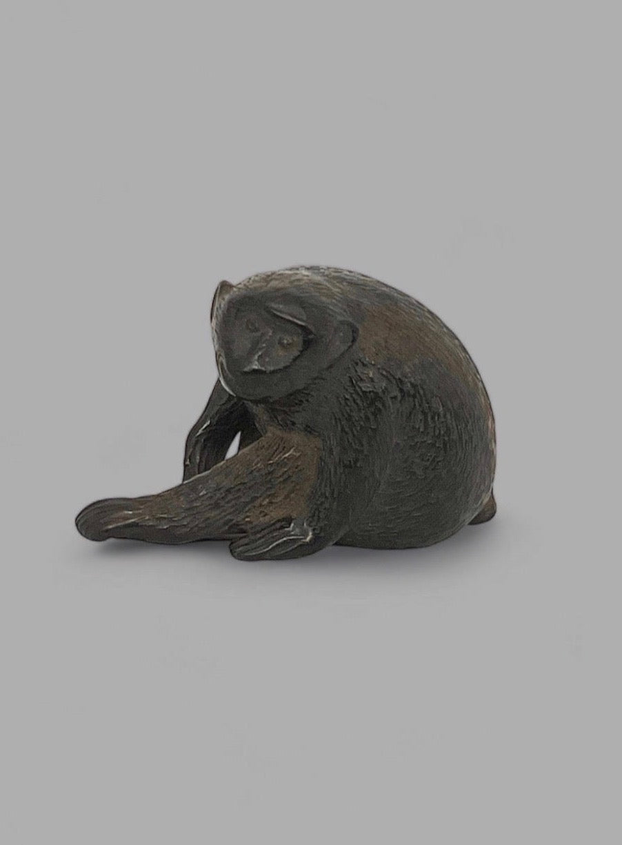 A Fine Japanese wooden netsuke of a monkey.Edo period