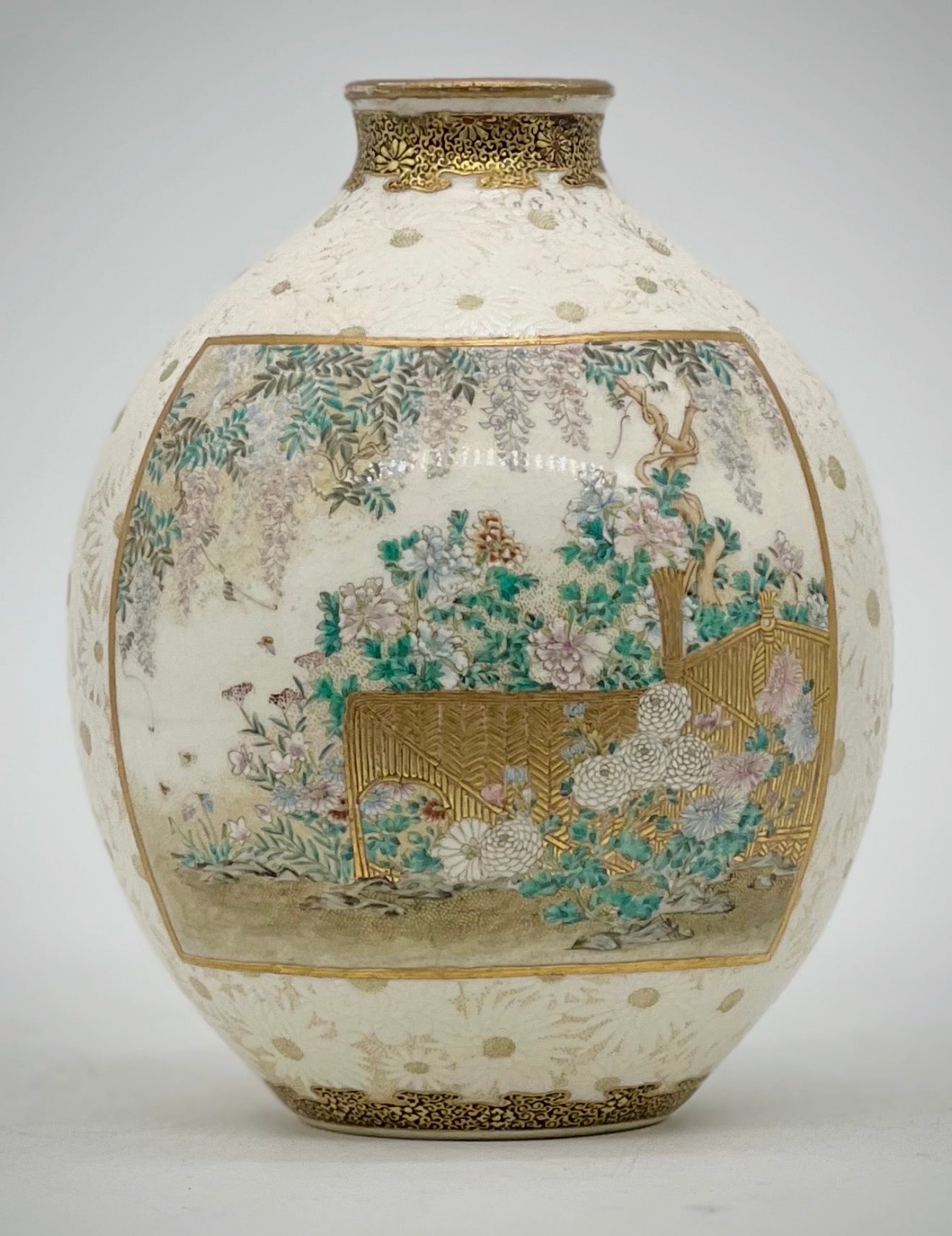 A Rare pair of Japanese Satsuma vases by Kinkozan.Meiji period