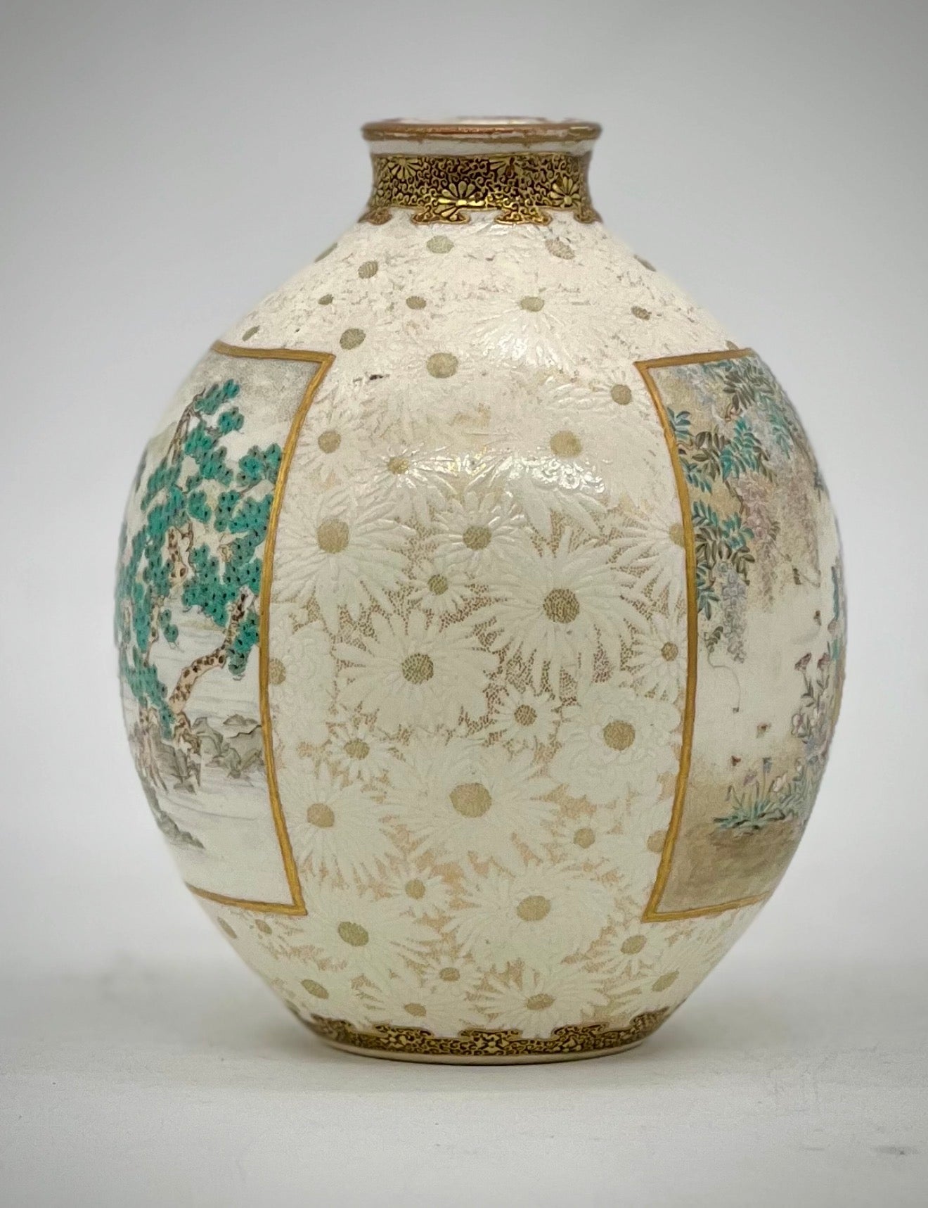 A Rare pair of Japanese Satsuma vases by Kinkozan.Meiji period