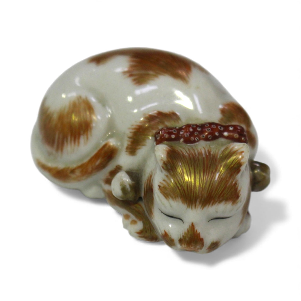 A Rare Japanese Kutani Porcelain Netsuke of a Sleeping Cat Meiji period
