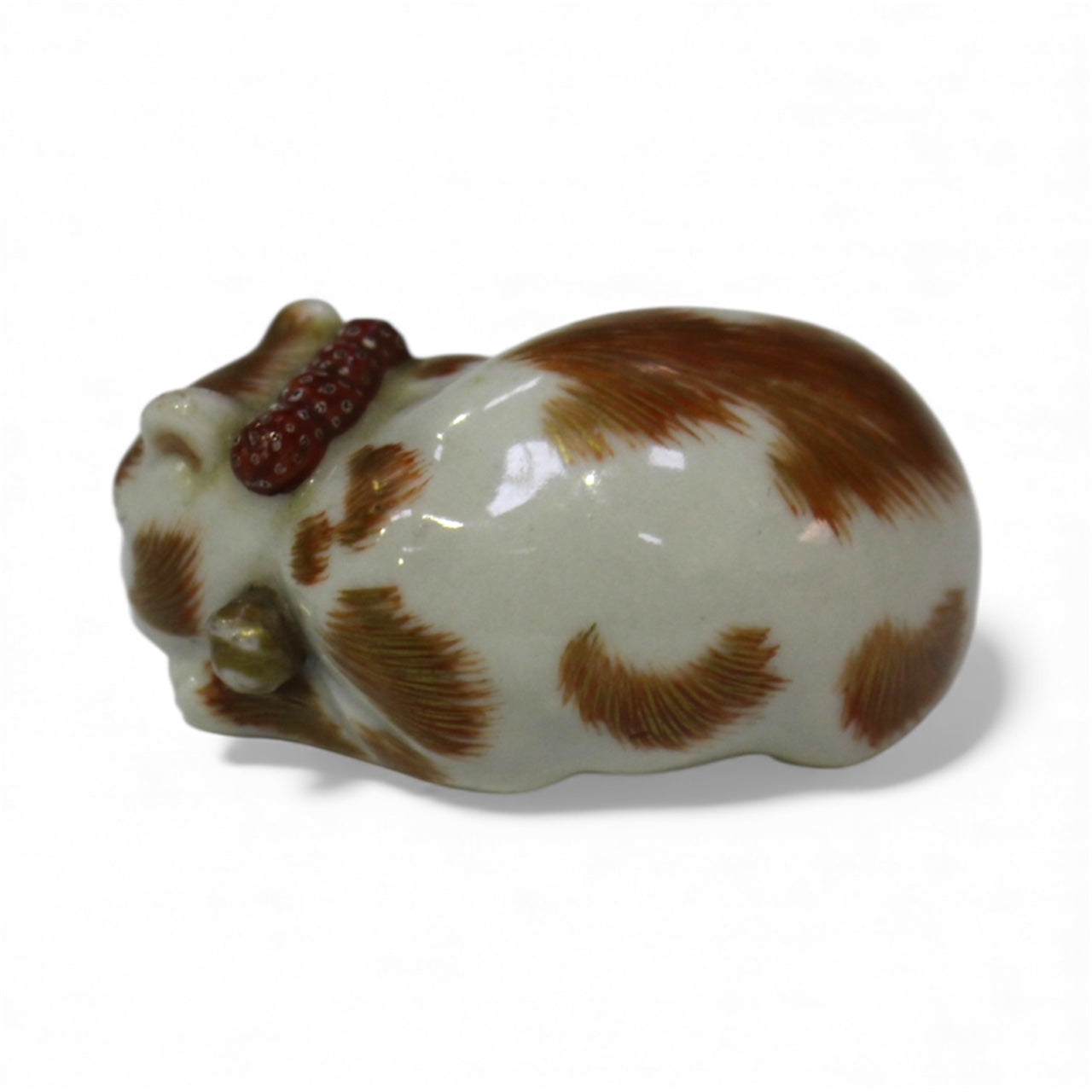 A Rare Japanese Kutani Porcelain Netsuke of a Sleeping Cat Meiji period