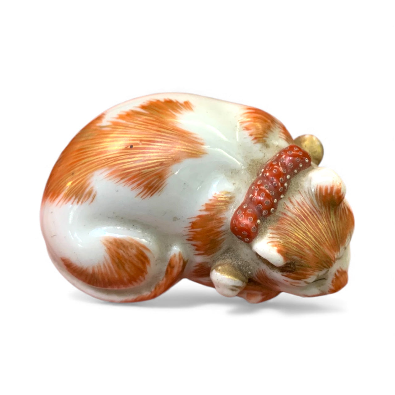 A Rare Japanese Kutani Porcelain Netsuke of a Sleeping Cat Meiji period